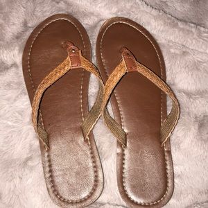 Brown flip flops